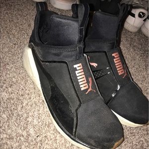 pink and black pumas